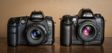 обоя canon d60 nikon d100, бренды, - другое, фотокамеры