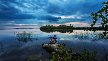Картинка sundown on tranquill lake природа реки озера трава камни остров озеро