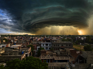 Картинка города -+здания +дома метеорологическое явление грозовые облака здания хмурое небо пакистан