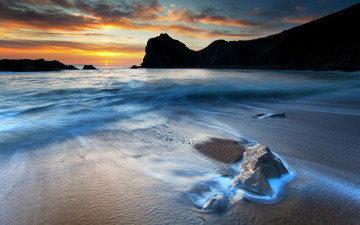 Картинка природа восходы закаты море небо закат скалы прибой берег волны облака солнце песок камни
