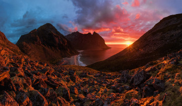 Картинка природа восходы закаты sunset sea sun norway landscapes stones rain sky clouds landscape red northern mountains