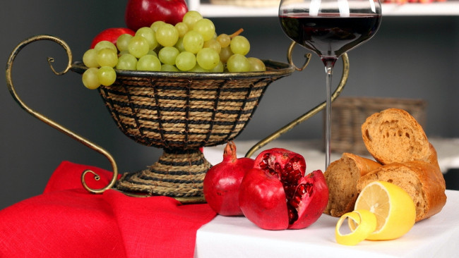Обои картинки фото еда, разное, лимон, вино, хлеб, гранат, виноград