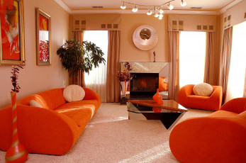 Картинка интерьер гостиная диван кресла вазон камин
