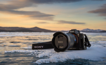 Картинка бренды sony сони закат горы озеро лед снег фотоаппарат камера