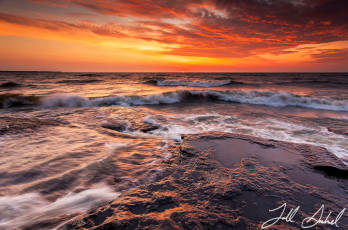 Картинка природа моря океаны небо скалы вода камни океан закат вечер выдержка море облака